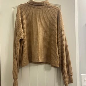Camel colored cropped turtle neck sweater